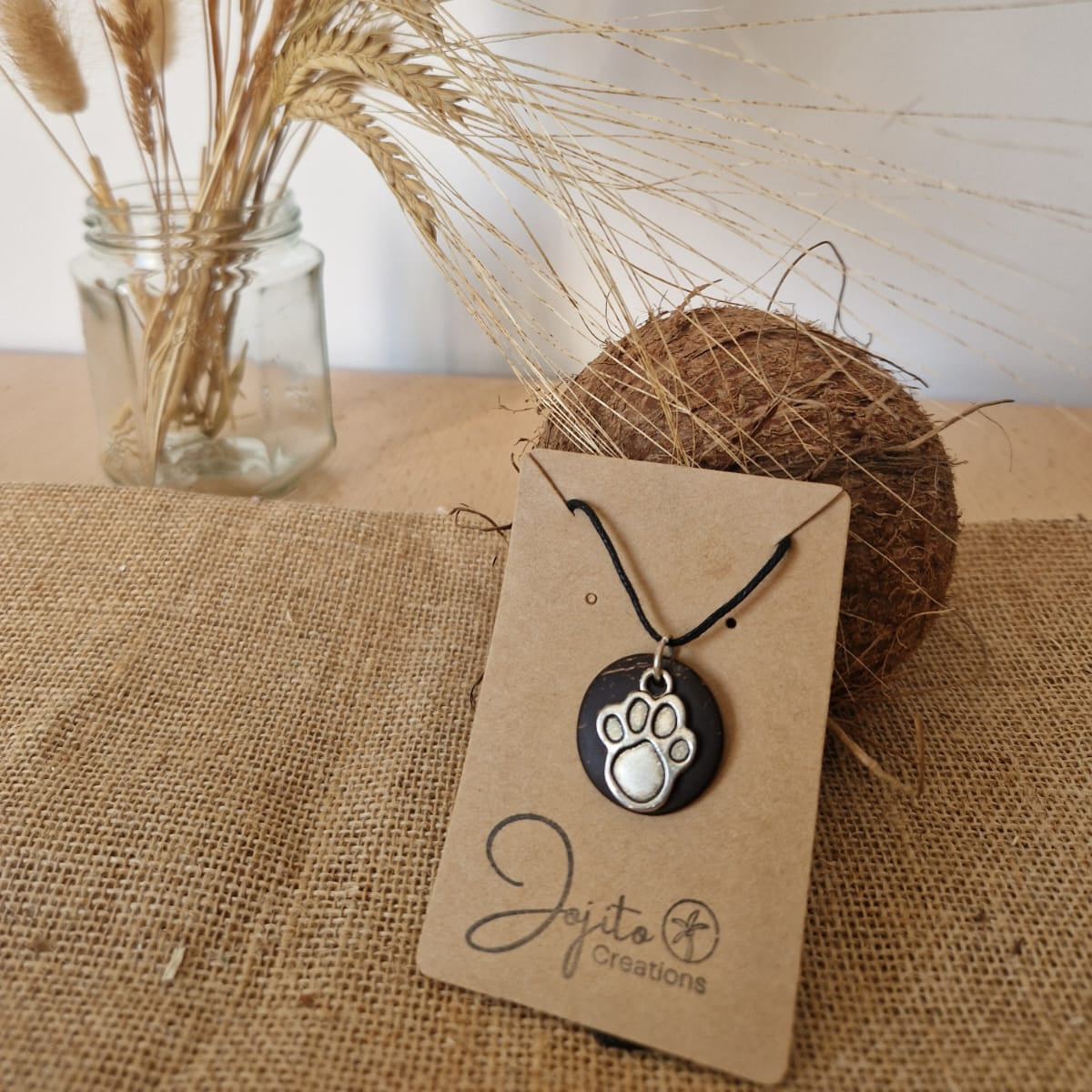 Dog Paw Print Silver Charm on Coconut Shell Backing
