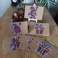 Hand Painted Vibrant Red and Blue Santa , Father Christmas and Christmas Present Christmas Cards. Festive Greetings Cards